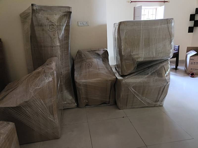 Sofa and armchairs wrapped for relocation