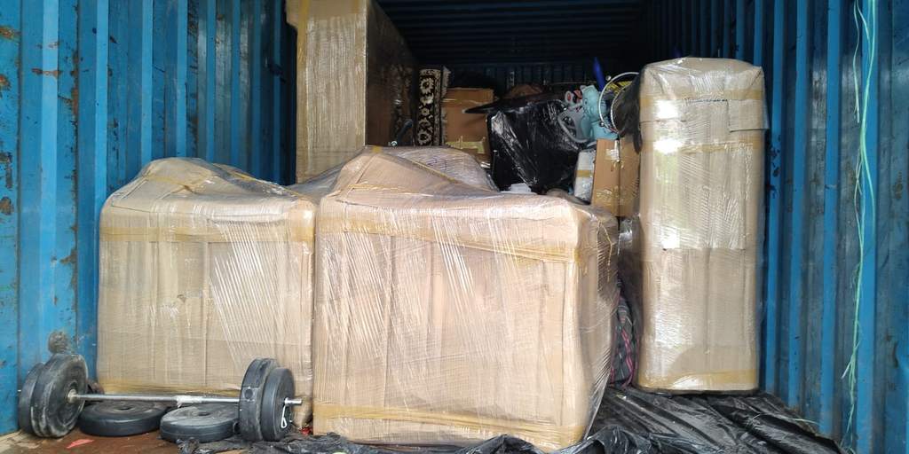 Household goods loaded in a closed container truck